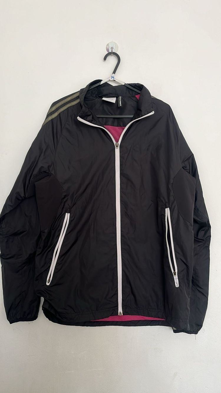 Black Zip-Up Jacket With White Zipper And Pockets